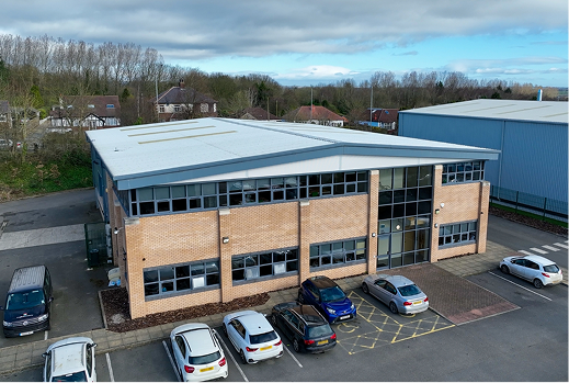 The drone shot of the whole Kirklees Pivot School and car park.